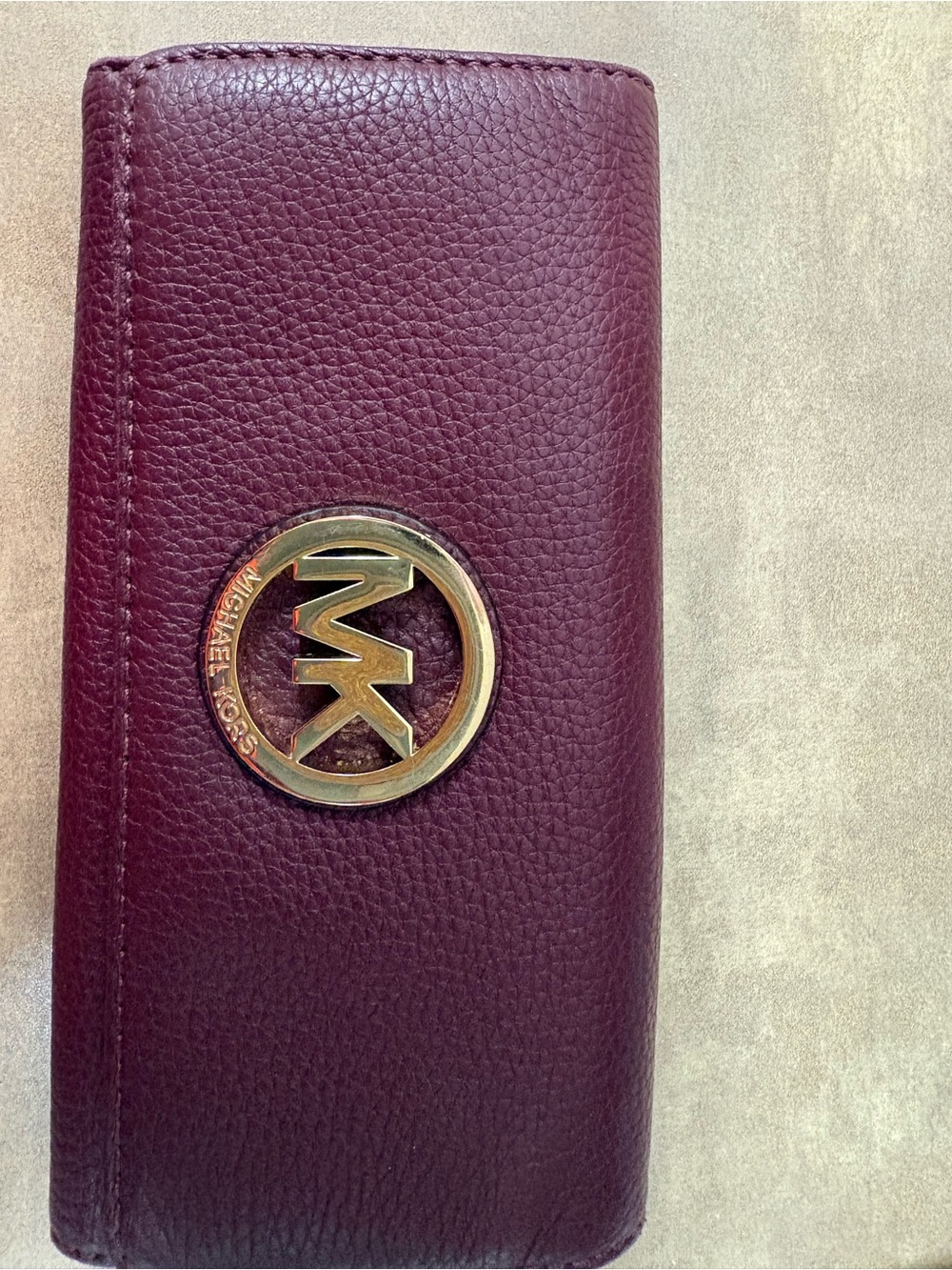Michael Kors Wine Leather wallet with Gold MK Emblem- perfect for Fall